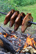 Schweineschulter am Spieß gebraten