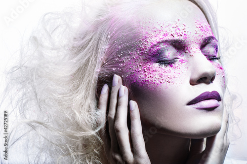 Photo: beautiful fashion woman portrait with color face art beautiful fashion woman portrait with color face art