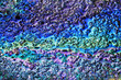 Color gasoline fuel spot on black asphalt