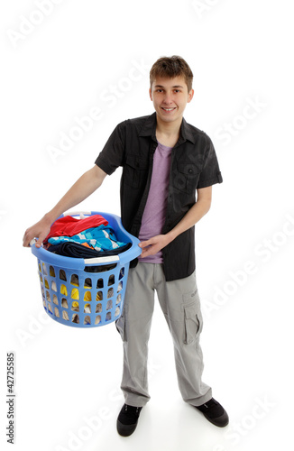 Photo: Teenager with laundry Teenager with laundry