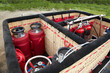 Woven basket with gas equipment for a hot air balloon