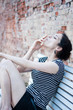 Beautiful young woman smoking