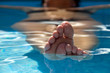 Photo: woman underwater in pool woman underwater in pool