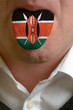 man tongue painted in kenya flag symbolizing to knowledge to spe