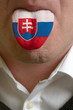 man tongue painted in slovakia flag symbolizing to knowledge to