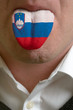 man tongue painted in slovenia flag symbolizing to knowledge to