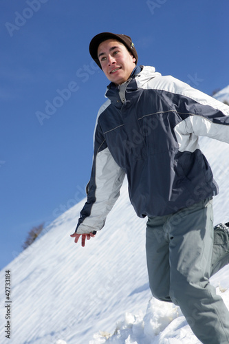 Photo: Man playing in the snow Man playing in the snow