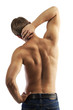 Photo: Rear view of a muscular young man in jeans with bare torso Rear view of a muscular young man in jeans with bare torso