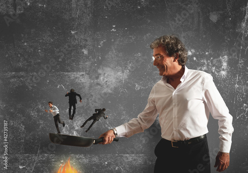 Photo: Concept of burning in the pan the competitor Concept of burning in the pan the competitor