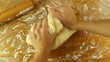 Video: Housewife knead the dough for donuts with hands Housewife knead the dough for donuts with hands