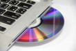 Photo: cd or dvd disk in laptop cd or dvd disk in laptop