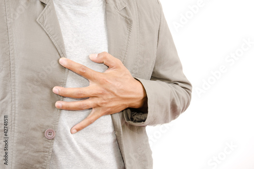 Photo: Businessman Suffering From Heart Attack. Businessman Suffering From Heart Attack.