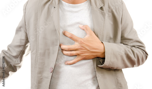 Photo: Businessman Suffering From Heart Attack. Businessman Suffering From Heart Attack.