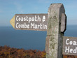 Signpost on coastal path over Trentishoe Down