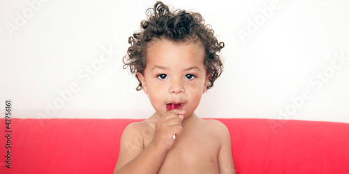 Photo: Kind mit Lutscher Kind mit Lutscher