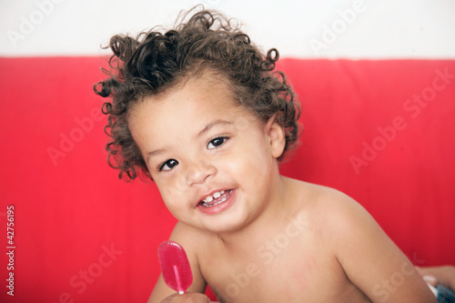 Photo: kind mit Lutscher kind mit Lutscher