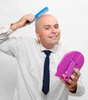 Hairless businessman with mirror - forever beautiful.