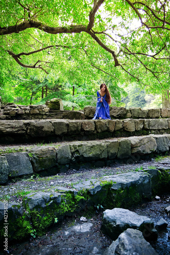 Photo: elf princess on stone staircase elf princess on stone staircase