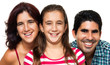 Happy hispanic family isolated on white (dad,mom and girl)