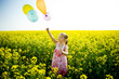 Balloons on a yellow field