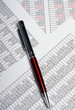 Photo: Business spreadsheets with pen Business spreadsheets with pen