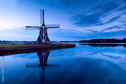 Photo: windmill in dusk windmill in dusk