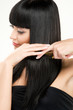 Foto: brunette brushing hair brunette brushing hair