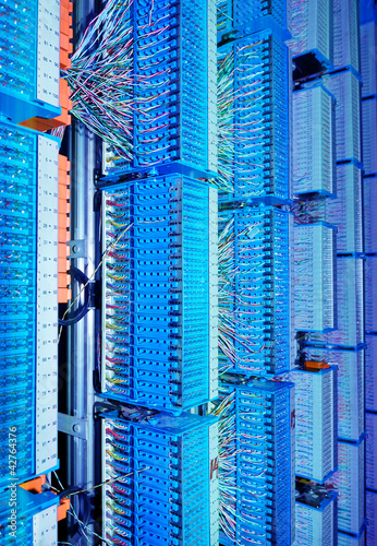 Photo: network server room routers and fiber optical cables network server room routers and fiber optical cables