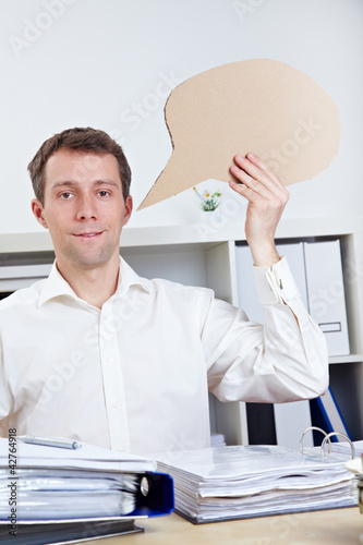 Photo: Manager mit Sprechblase Manager mit Sprechblase
