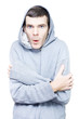 Cold shivering man in winter clothes