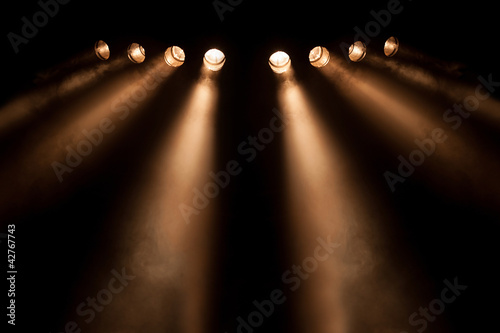 Photo: Eight divergent spotlights at night Eight divergent spotlights at night