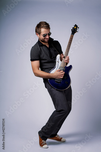 Photo: Rockstar guitar player Rockstar guitar player