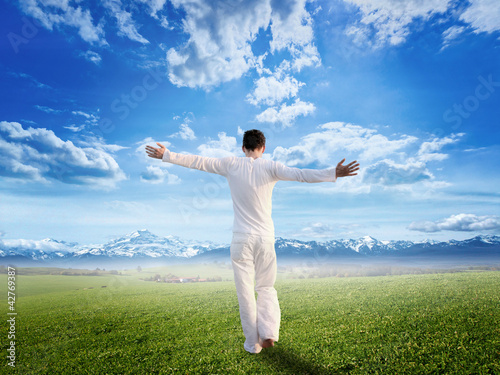 Photo: Enjoying pure freedom | Man on a meadow Enjoying pure freedom | Man on a meadow