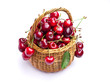 Photo: Delicious sweet cherry fruits in wicker basket Delicious sweet cherry fruits in wicker basket