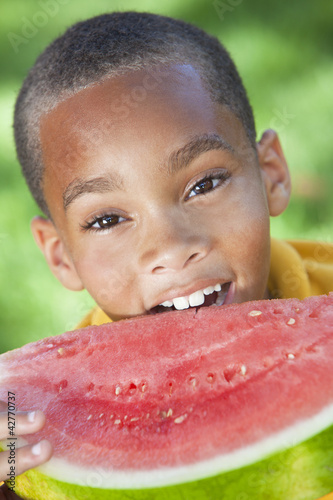 Photo: Happy African American Boy Child Eating Water Melon Happy African American Boy Child Eating Water Melon