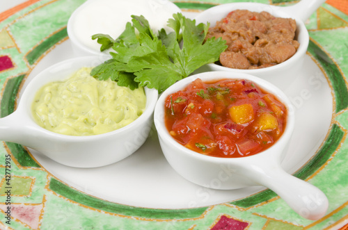 Photo: Mexican Dips - Salsa, Guacamole, Sour Cream & Refried Beans Mexican Dips - Salsa, Guacamole, Sour Cream & Refried Beans