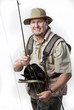 Fly fisherman ready for catching trout.
