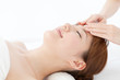Beautiful young woman in spa. Portrait of asian.