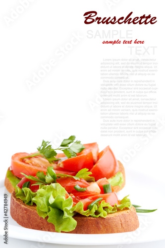 Photo: Italian Bruschette isolated on a white background Italian Bruschette isolated on a white background