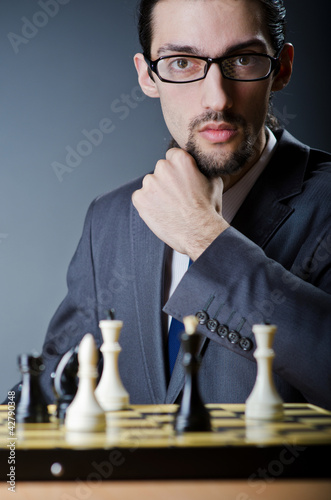 Photo: Chess player playing his game Chess player playing his game