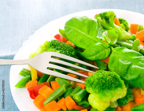 Photo: Mixed vegetables on a plate Mixed vegetables on a plate