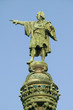 Photo: Statue of Christopher Columbus points west to New World, next to waterfront of Port Vell, Barcelona, Spain Statue of Christopher Columbus points west to New World, next to waterfront of Port Vell, Barcelona, Spain