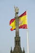 Photo: Spanish flag waves behind statue of Christopher Columbus, Plaza de Col—n in Madrid, Spain Spanish flag waves behind statue of Christopher Columbus, Plaza de Col—n in Madrid, Spain