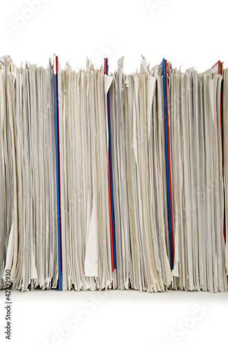 Photo: Pile of folders full of papers Pile of folders full of papers