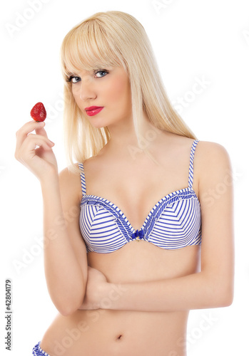 Photo: Portrait sexy woman in lingerie holding strawberry Portrait sexy woman in lingerie holding strawberry