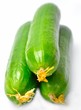 Foto: Three cucumber top of each other from the front Three cucumber top of each other from the front