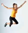 Photo: a woman jumps high a woman jumps high