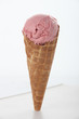 Foto: Single cone of pink ice-cream Single cone of pink ice-cream