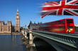 Big Ben with red city bus in London, UK