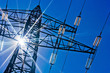 Foto: Stromleitung mit Sonne Stromleitung mit Sonne